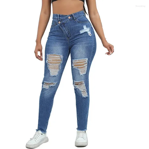 Calças de brim femininas lápis fino moda buracos quebrados oco para fora cintura alta botão inclinado calças jeans feminino casual apertado estiramento