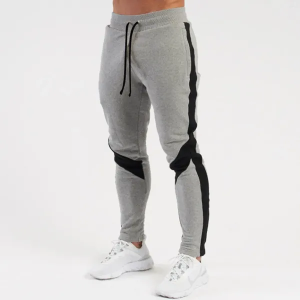 Pantaloni da uomo jogger pantaloni della tuta che corrono pantaloni sportivi da allenamento in pile fiancheggiate maschili jeans di jeans stretch