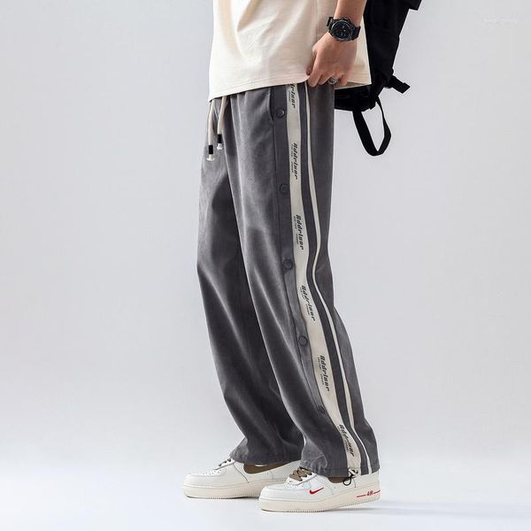 Pantaloni da uomo Xpkaeax Marchio di moda originale Barre parallele Design con bottoni Stampa di lettere Pantaloni casual Street Handsome Sports Ins