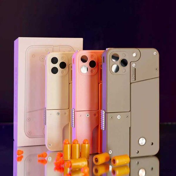 Case di telefonia cellulare Mini Custodia per il cellulare creativo per adulti Nuovo pieghevole soft cellulare a spruzzo mobile bullet pistola decompressione shell m7u2