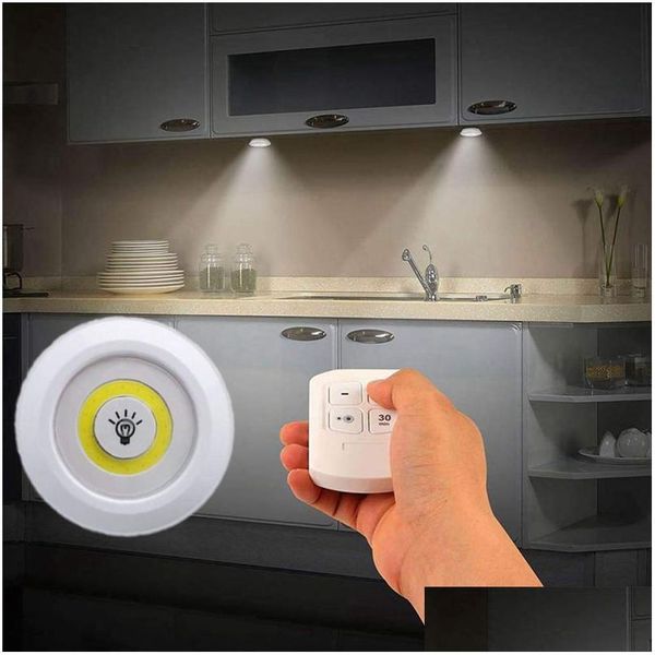 Luci notturne dimmerabili a LED sotto la luce dell'armadio con telecomando Armadi a batteria per armadio Illuminazione del bagno Drop Deliv Dhmr4