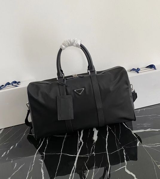 Famous Designer Bag per bagagli, borsa da viaggio, classico nero e alla moda Nuova borsa grande ad alta capacità, impermeabile universale e resistente all'usura per uomini e donne