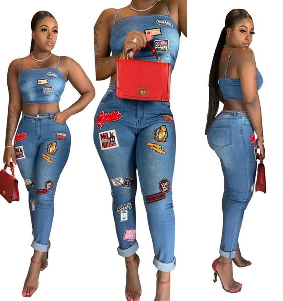 Cartoon Patch Jeans zweiteilige Set Fashion gestaltet Spaghetti -Träger Crop Top Curled Jeans 2019 Neue Frauen sexy Nachtclubanzug Casu6047645