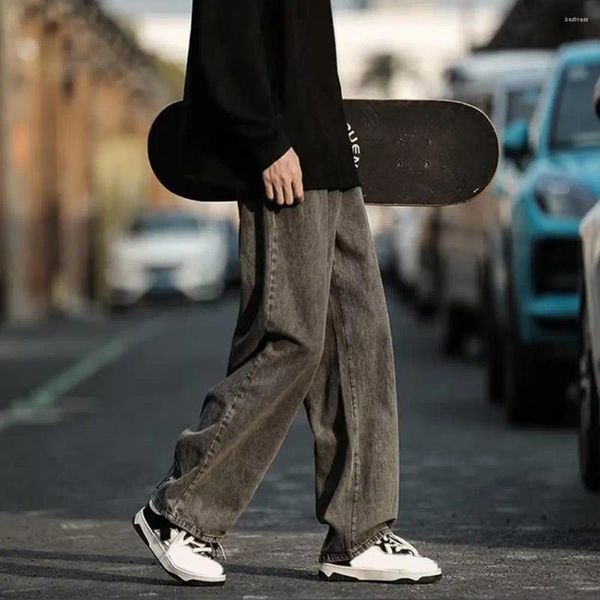 Jeans masculinos calças longas calças de rua largo com desenho animado bordado de bordados elásticos de cintura profunda na moda para moda na moda
