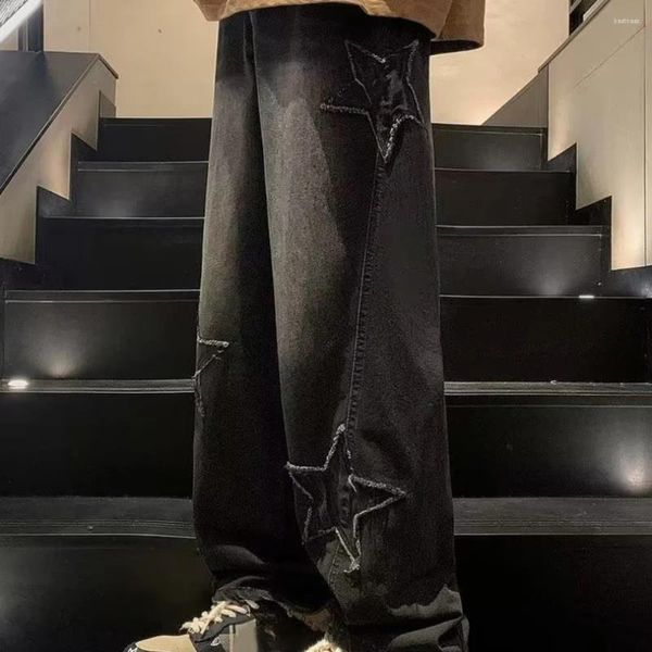 Os jeans masculinos alcançam uma aparência única com calças retas estéticas de estrela de rua larga de rua larga do Y2K