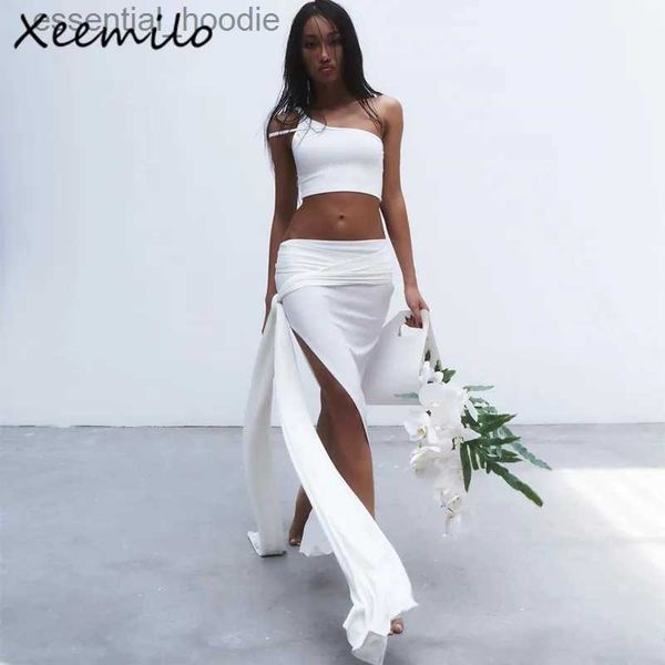 Vestido de duas peças onde temperamento temperamento branco Bodycon Mulheres de duas peças Conjunto sexy de tira de alcance único Sexy com bandagem High Slit Long Hip Saias L231225