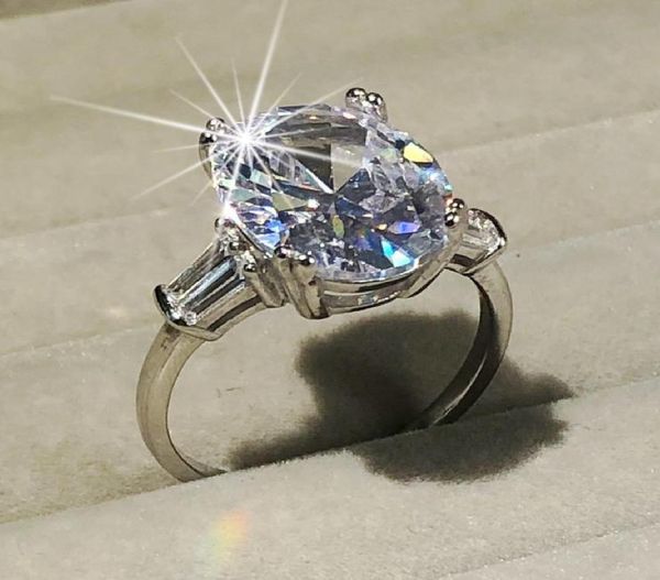 Anelli con diamanti simulati in argento sterling 925 con taglio ovale 4CT per le donne Set di anelli di fidanzamento eterno Regalo di alta gioielleria di marca5672463