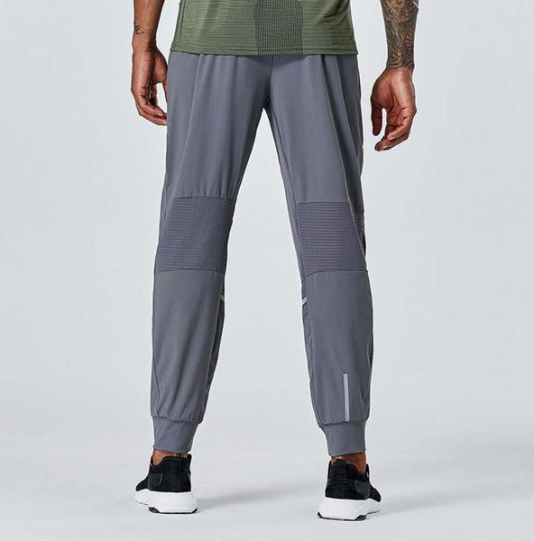 LL Jogger para hombre Pantalones largos Traje deportivo de yoga al aire libre para correr Yogo Gym Bolsillos Pantalones deportivos Pantalones para hombre Casual Cintura elástica fitness 777