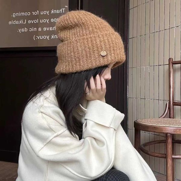 O calor do outono e o inverno empilham o chapéu de lã para mulheres de versão coreana de cor sólida de cor sólida