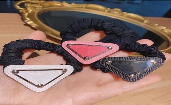 Elastici per capelli con lettera triangolare europea e americana Pezzo di ferro Accessori per coda di cavallo Femmina Consegna veloce di alta qualità7431256