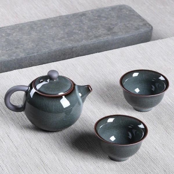 Conjuntos de chá estilo chinês artesanal celadon esmaltado ferro fundido um pote dois copos de porcelana conjunto de chá bule