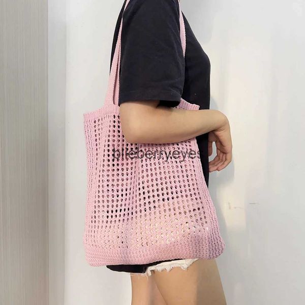 Umhängetaschen Mode Frauen hohl gestrickte Tasche Einfache Häkelstapeldesigner handgefertigtes Einkaufsbetriebshandtasche Pursebleberryes handgefertigt