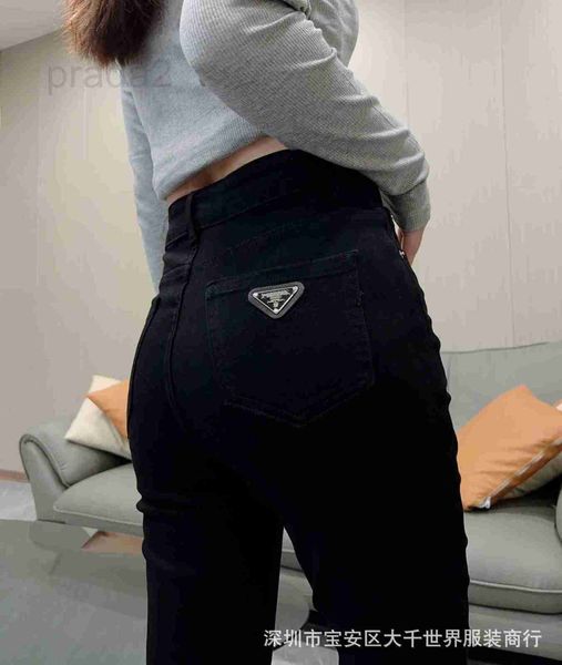 Jeans femininos designer de alta qualidade outono metal triângulo sinal marinheiro macio alto elástico lápis denim calças em saco traseiro para mulheres 7w74