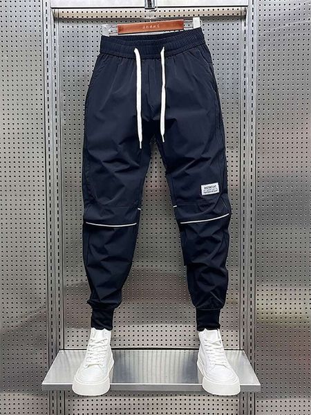 Pantaloni sportivi da jogger da esterno Pantaloni harem da uomo a vita bassa Pantaloni larghi di alta qualità Abbigliamento firmato