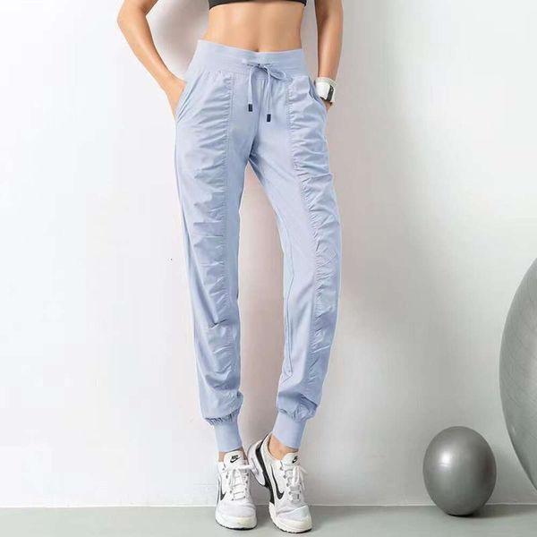 Pantaloni della tuta Leggings LL per donna Pantaloni da jogging firmati Pantaloni della tuta larghi Fitness da donna Corsa Stretch Piedi dimagranti Pantaloni della tutalululemen 920