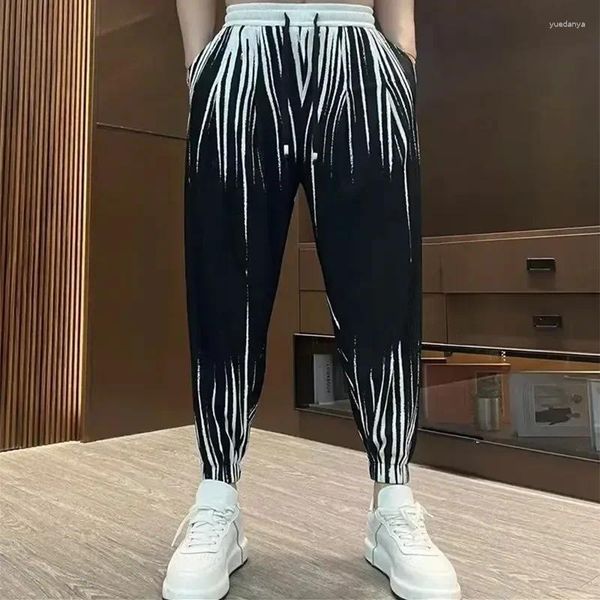 Pantaloni da uomo Pantaloni sportivi elasticizzati a righe bianche nere da uomo Harajuku Street Style Harem Pantaloni estivi di marca streetwear estivi di alta qualità