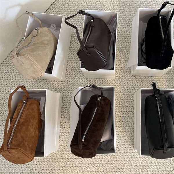 Die verbesserte Version hat eine Schaffellreihe Leder -Stifthaltertasche kleiner runde Tasche Unterarm kleiner Tasche und 90er echte Lederhandtasche für Frauen