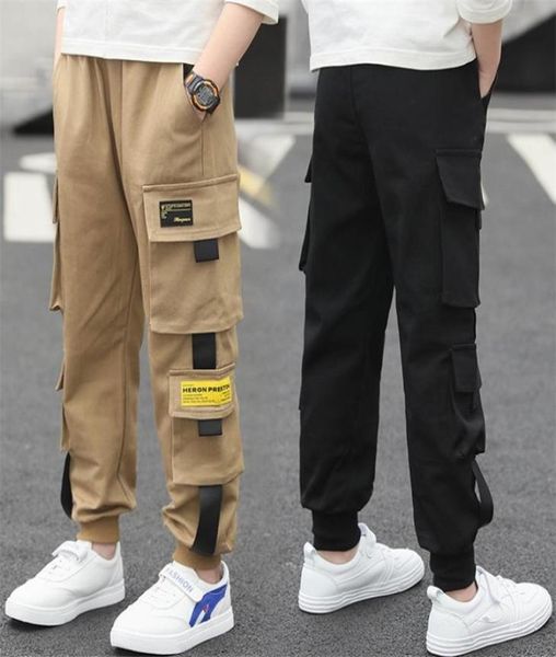 Pantaloni cargo laterali per bambini con nastro adesivo stile sciolto per adolescenti Pantaloni cargo neri kaki Pantaloni sportivi classici per bambini per Big Boy 413 anni LJ1123260