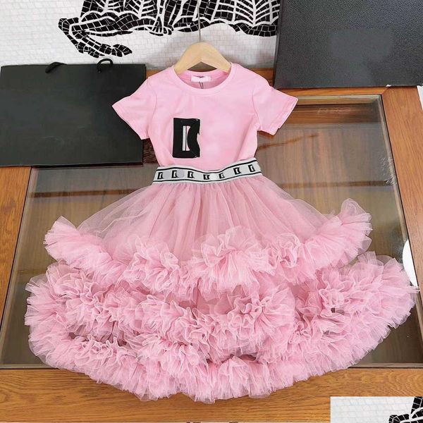 Set di abbigliamento 23Ss Gonna Set Kid Bambini Abiti firmati Ragazze Girocollo Puro cotone Lettera Ricamo T-shirt Torta Net Filato Lungo Mezza Dhqpj