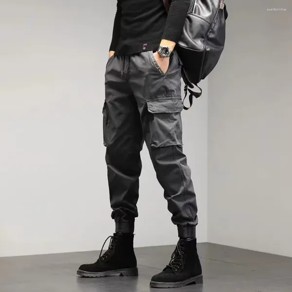 Pantaloni da uomo alla moda cargo larghi con tasche multiple pantaloni tattici dritti tinta unita tuta da escursionismo all'aperto