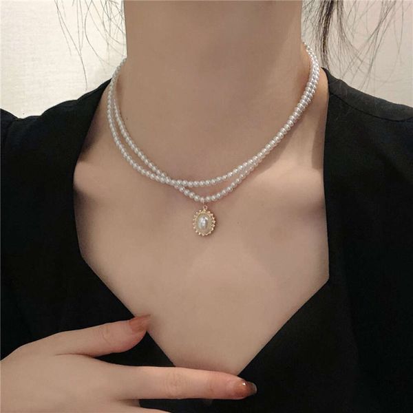 Elegante collana di perle francesi retrò a doppio strato per catena alla clavicola da donna, ornamento per il collo dal design minimalista e di nicchia