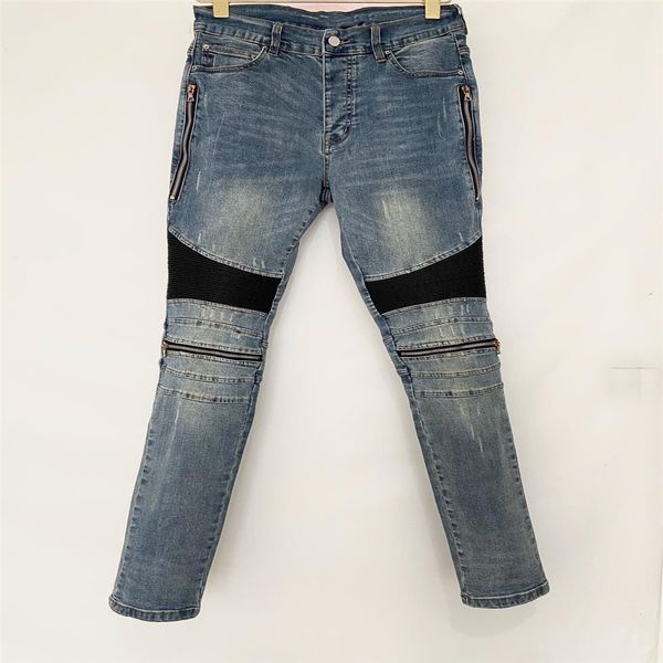 Designer de luxo Mens jeans Calças compridas Zíper skinny Joelho preto azul Spell couro Destroy the quilt Jeans fashion com furos rasgados Men D1930