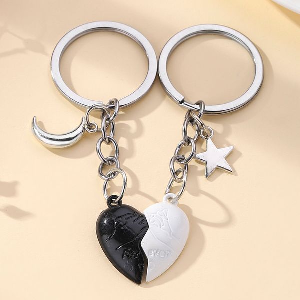 Coppia creativa coppia di amore magnetico in bianco e nero di portachiavi ciondolo decorativo custodia per telefono zainetto
