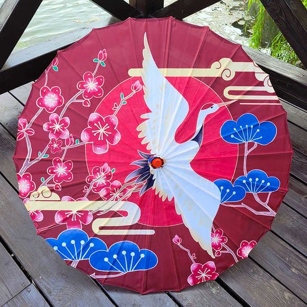 Ombrelli Retro Gru Panno di seta Ombrello da donna Arte cinese Grazioso uccello Ombrello da danza antica Carta a olio Manico in legno Ombrello decorativo