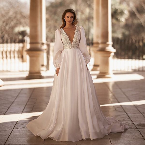 Abiti da sposa eleganti con perle A Line Collo trasparente Abito da sposa con maniche a sbuffo senza schienale Plus Size Bohoemian Vestiod De Mariee 326 326