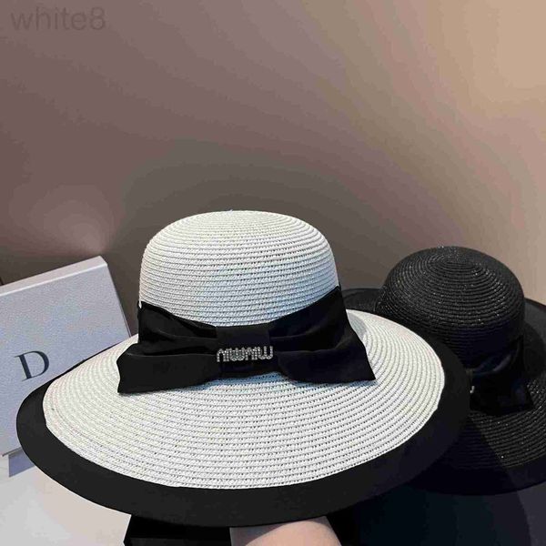 Ball Caps designer Estate nuovo cappello di paglia con fiocco parasole a tesa larga Gioco da spiaggia all'aperto Resistente ai raggi UV che blocca la corrispondenza dei colori Secchio WJX2