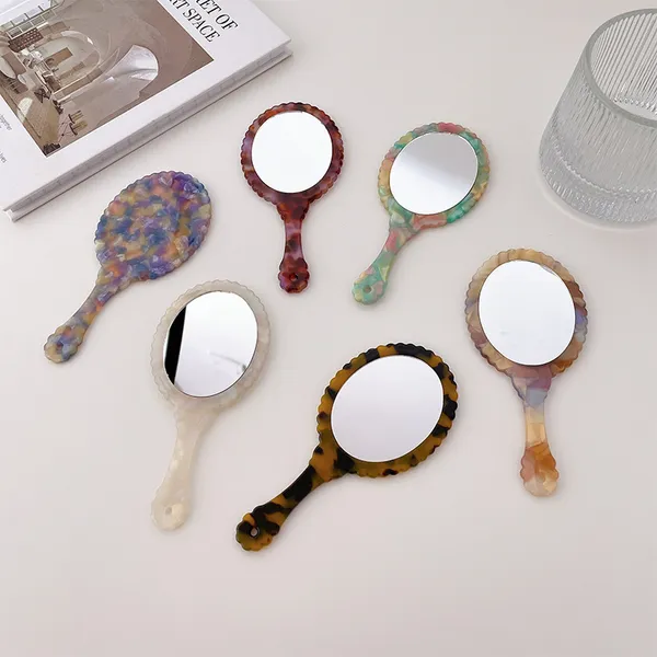 Specchi compatti di forma ovale all'ingrosso con supporto Specchio per trucco moda lato singolo Specchi cosmetici tascabili per ragazze da donna