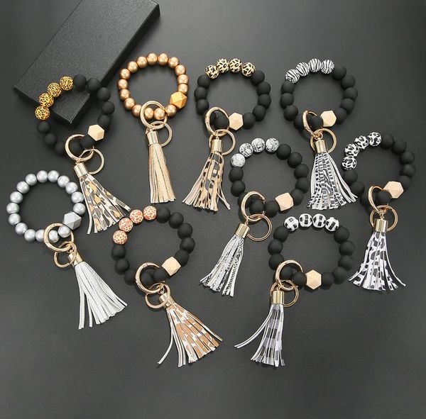 Commercio all'ingrosso anti-perso della catena chiave di legno della nappa della catena chiave del braccialetto del branello glassato delle nuove decorazioni di Natale