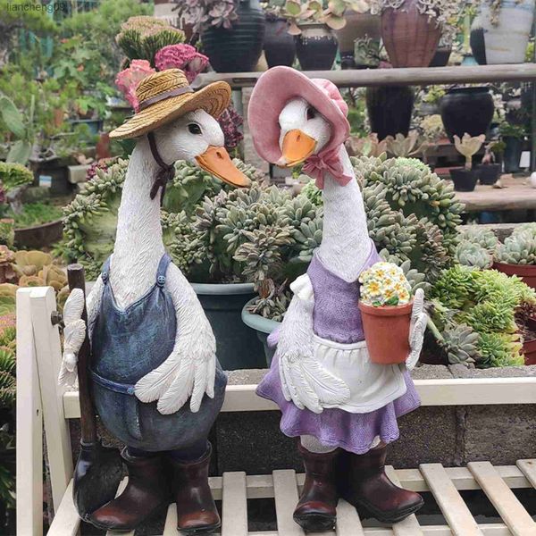 Lawn Decorative Statue Mini Cute Rasin Duck Modelo Toys Ornamentos de jardim Ofícios de arte para pátio ao ar livre L230620