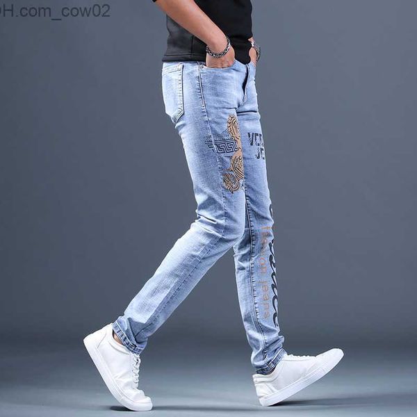 Jeans masculinos Jeans masculinos de alta qualidade estampados justos jeans elásticos leves e luxuosos jeans street rasgados e arranhados jeans casuais coreanos Z230713