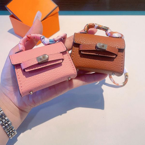 Дизайнерская сумка женщин мини -сумочка ключ кожа кожа наушники сумки Airpods роскошные ключи кольцо кольцо.