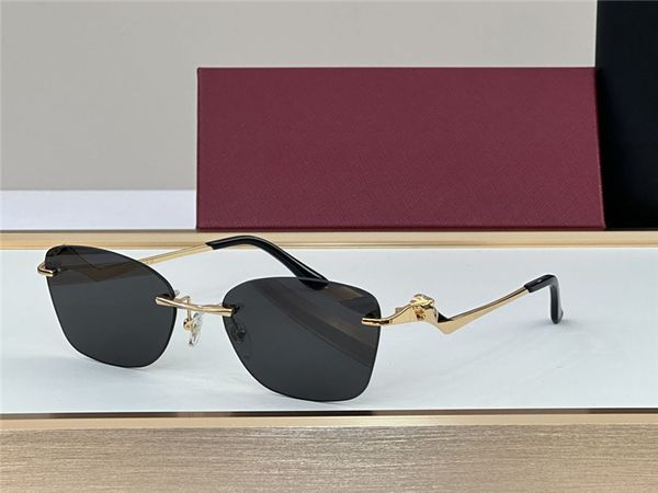 Óculos de sol clássicos femininos design sem aro óculos cat eye lentes UV400 K armação de ouro hastes de metal animal óculos de verão modelo 01200