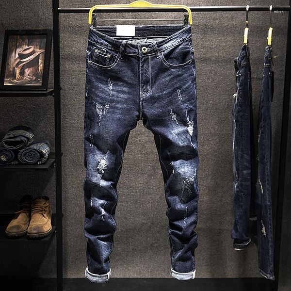 Jeans da uomo elasticizzati 2023 moda traforata versatili leggings coreani sottili e semplici abbigliamento da uomo skinny