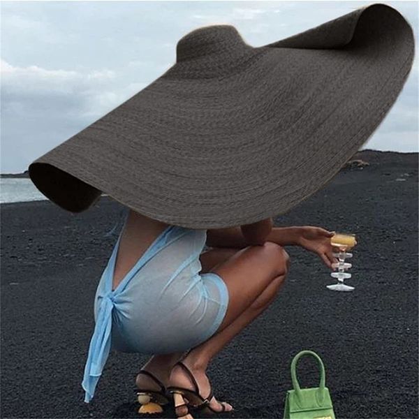 Cappelli a tesa larga Secchiello Cappello di paglia da spiaggia oversize per donna Moda Visiera grande Fatta a mano Roll Up Floppy Sun Summer Cap 230713