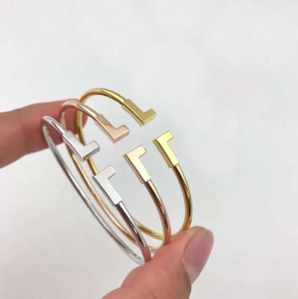 Moda pulseira de ouro invertido charme masculino pulseira marca designer homens e mulheres casamento casal diamante tênis jóias com caixa