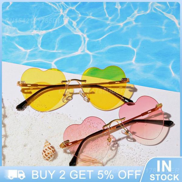 Sonnenbrillen / Lot Randlose herzförmige Damenmode Candy Color Party Sonnenbrillen Damen Klare bunte Brillen Großhandel