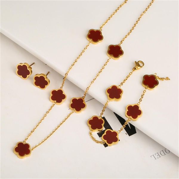 T-shirt in acciaio inossidabile S fiore 4 pezzi/set braccialetto ciondolo collana orecchini moda donna fiore a cinque foglie gioielli di tendenza