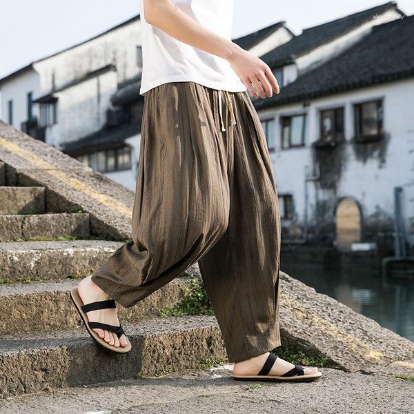 Pantaloni da uomo in stile cinese pantaloni di seta sottile ghiaccio estate uomo cotone lino sciolto dritto gamba larga abiti da uomo lunghi da spiaggia casual