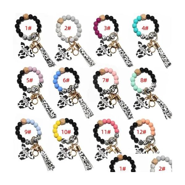 Lembrança de festa Fedex Sile Cursive Cow Bead Pulseira Disco de Madeira Chaveiro Tassel Cabeça de Boi Pulso Chaveiro Pingente Drop Delivery Home G Dhkym