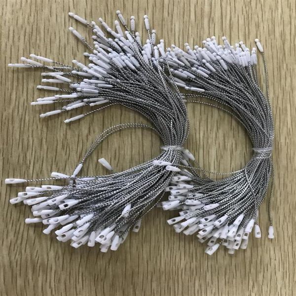 ufficio Stock Buona qualità testa di proiettile bianco appendere tag stringa in abbigliamento abbigliamento sigillo indumento Plug Loop Lock Cord Fastener 1003074