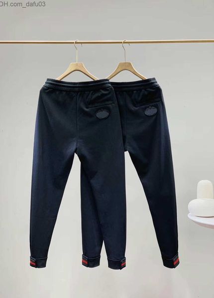 Calças masculinas 2020 calças masculinas Moda clássica calças de moletom estilo americano europeu Bordado de letras importadas Pés ajustáveis Calça tamanho asiático Z230720