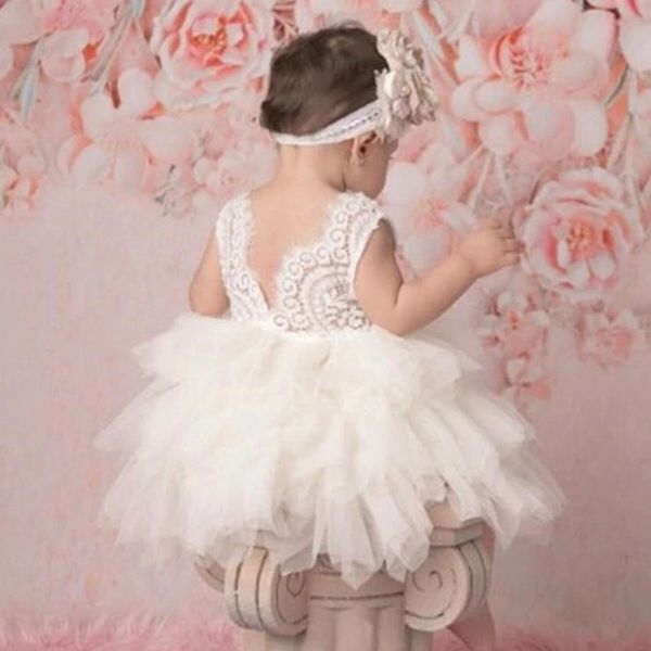 Vestito da ragazza di fiori per la festa di nozze Abiti da principessa di compleanno senza schienale per ragazze carine per bambini Abito da prima comunione in pizzo bianco