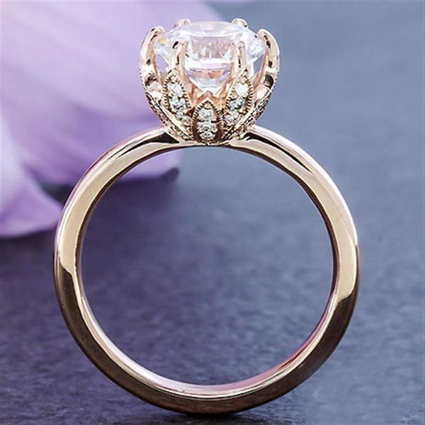 Nuovi modelli femminili dell'anello della corona del diamante di modo hanno placcato gli artigli del fiore dell'oro rosa 14k incastonati l'anello nuziale di zircone290J