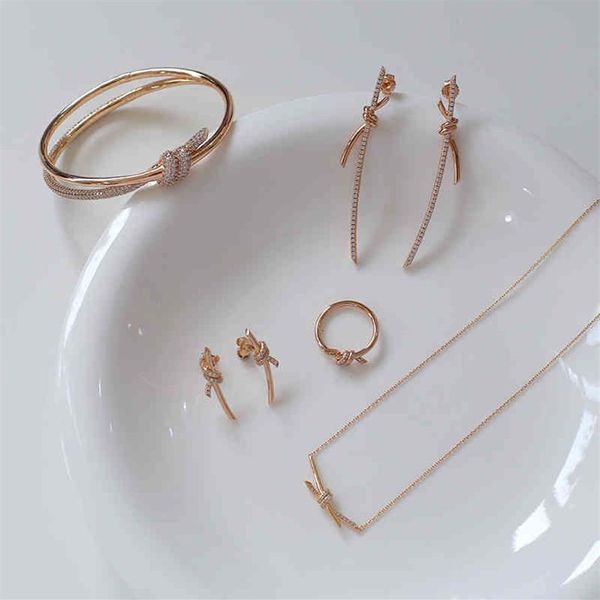 Brincos de laço de diamante de ouro rosa personalizado nó leve de luxo de alto sentido simples colar de nó 925 pulseira de prata anel286G
