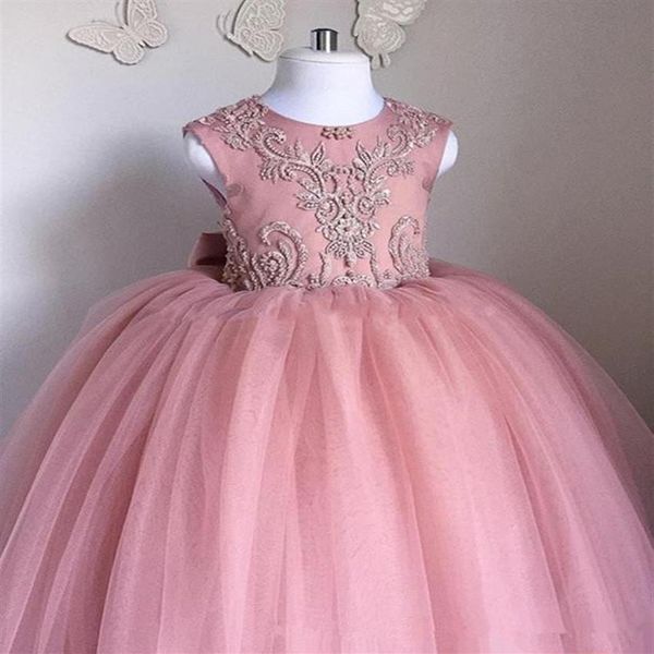 Abiti da ragazza di fiori principessa in tulle rosa Immagine reale 2019 Abiti da comunione senza schienale con fiocco abbinato Lunghezza pavimento Pizzo Spettacolo per bambini Gow200Z