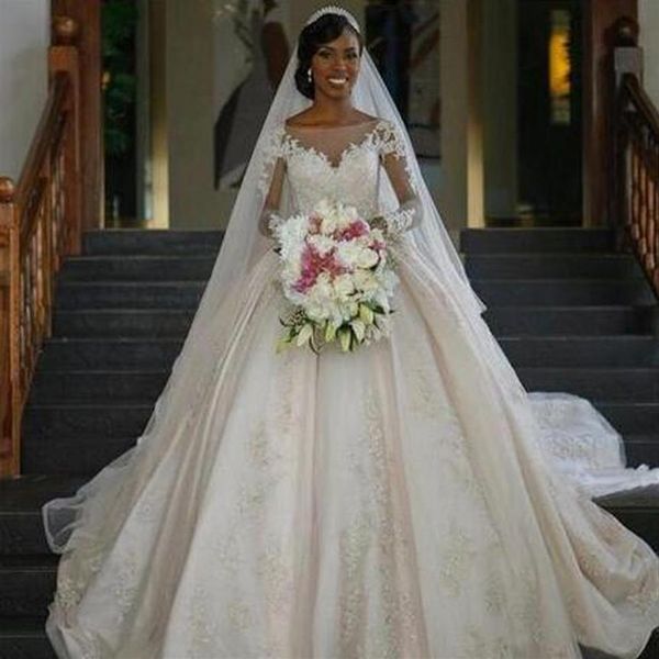 Kathedralen-Hochzeitskleid, wunderschönes afrikanisches Ballkleid-Hochzeitskleid, transparenter Bateau-Ausschnitt, Illusion, lange Ärmel, Spitzenapplikationen, bauschig, Br299J